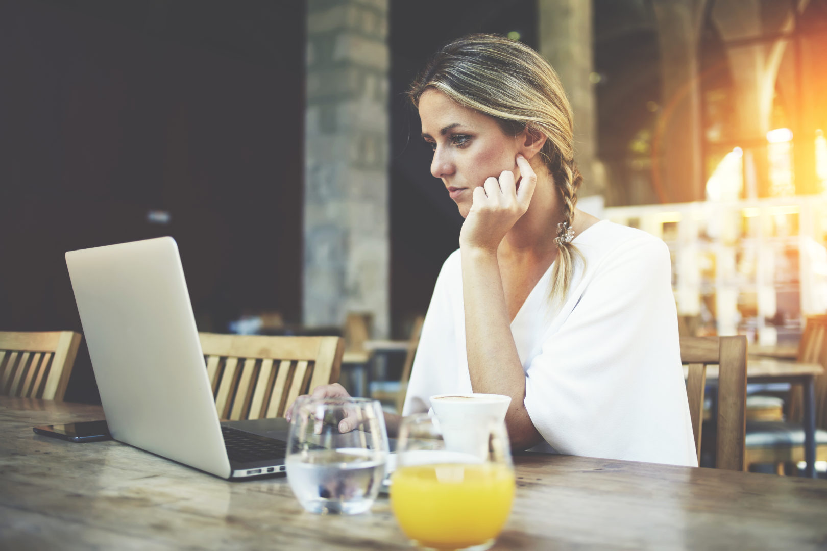 The Cloud solution, girl with laptop at wood table image